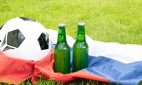 Beer bottles and a soccer ball.