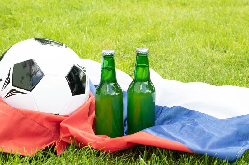 Beer bottles and a soccer ball.