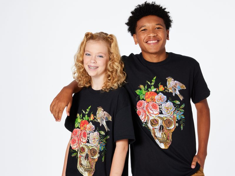 Five Below graphic tees with skulls and flowers.