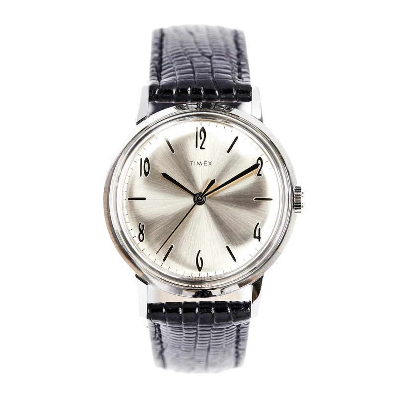 A silver Timex Marlin watch with a black band