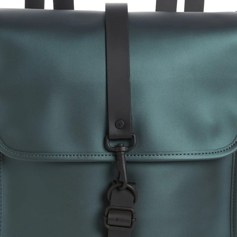 A silver pine RAINS Mini Waterproof Backpack.