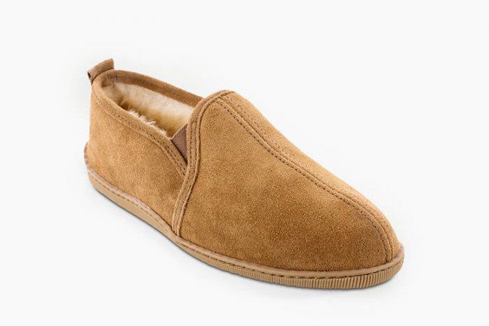 A brown sheerling slipper. 