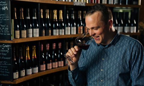 Peter Wassam enjoying some wine.