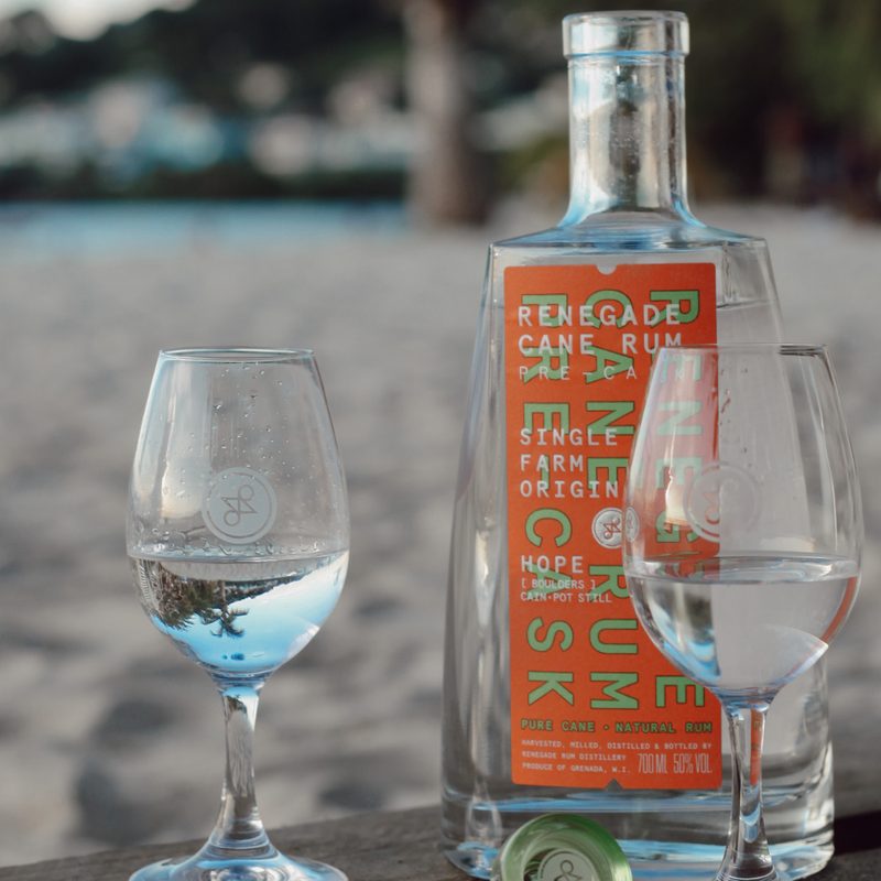 Renegade Rum and some tasting glasses on the beach.