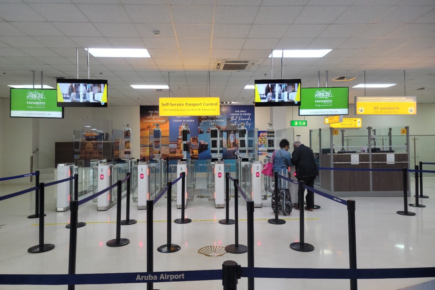 The passport security checkpoint at Queen Beatrix International Airport in Oranjestad, Aruba.