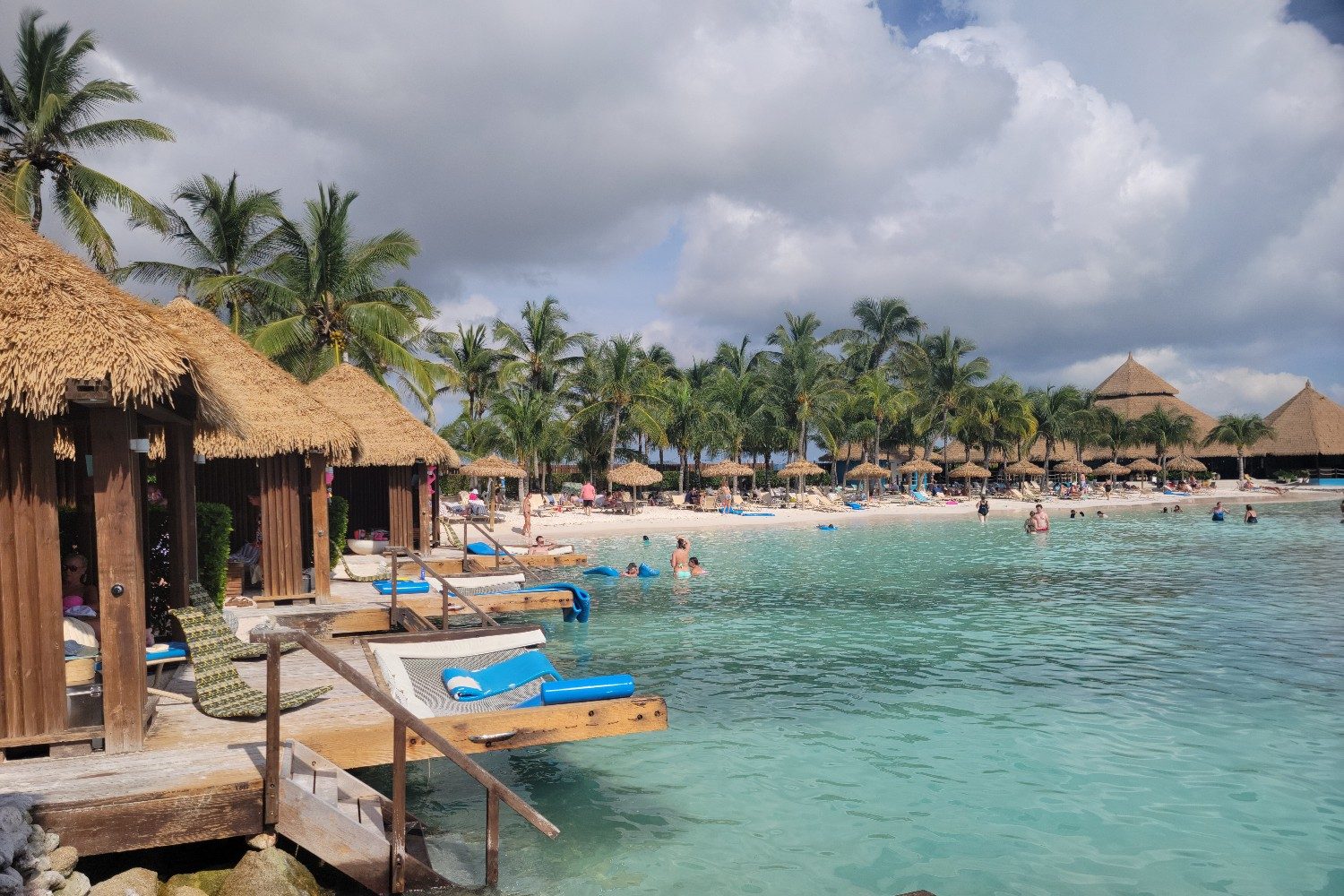 A cluster of private cabanas overlook Iguana Beach at Renaissance Island in Aruba.