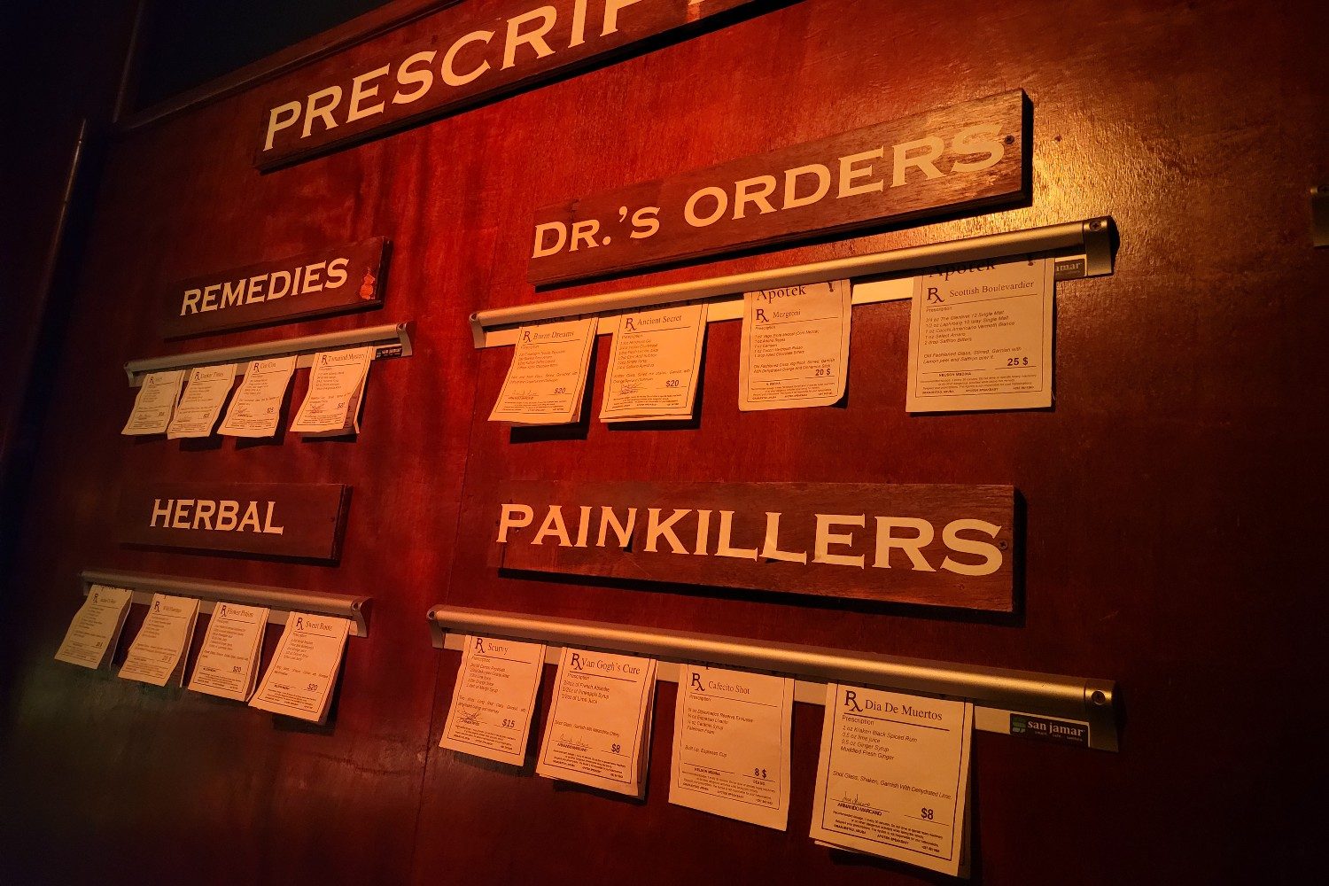The wall of "prescriptions" at Apotek (a speakeasy bar) in Oranjestad, Aruba.
