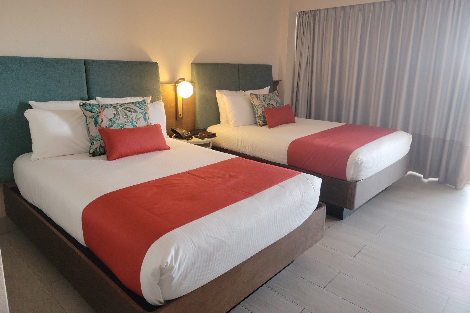 A double queen bed hotel room at Dreams Curacao.
