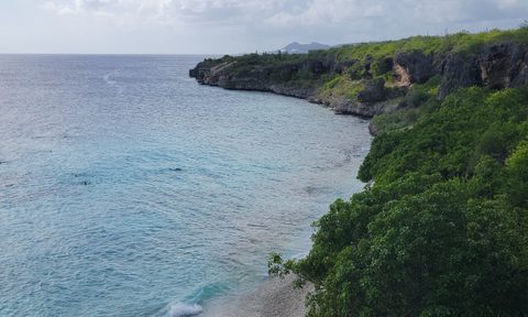 A view of the beach at 1000 Steps Beach in Bonaire, Caribbean Netherlands.