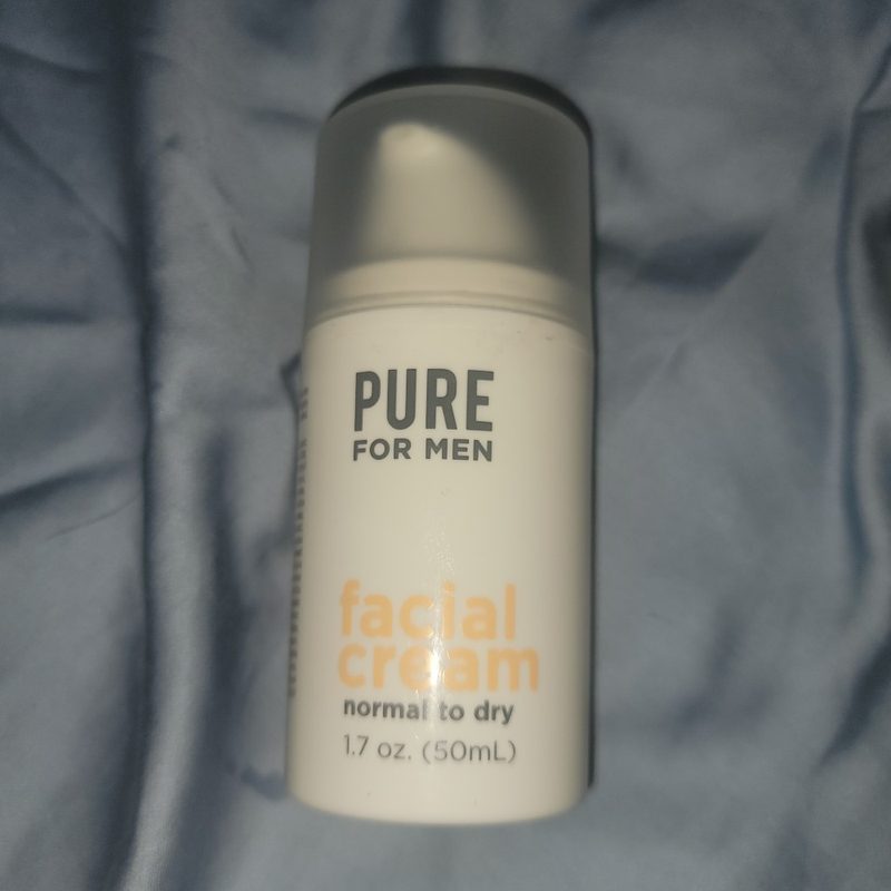 A tube of Pure for Men Facial Cream.