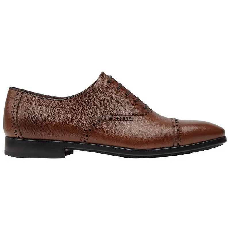 Salvatore Ferragamo cap toe oxfords.