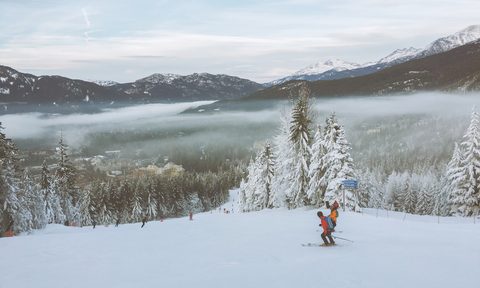 Two skiers at Whistler Blackcomb ski resort