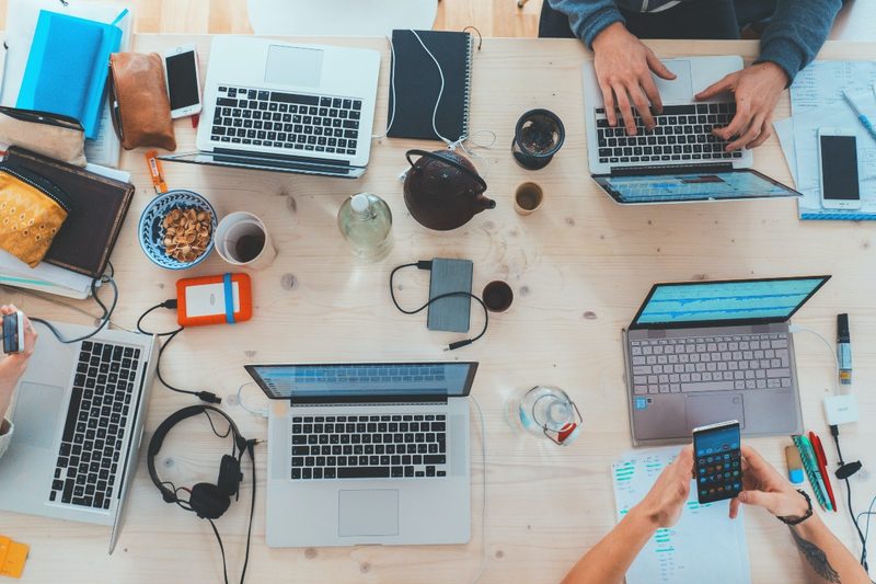 people-on-computers-at-table