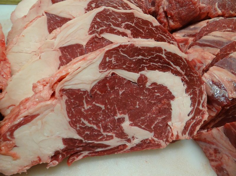Raw ribeye steaks