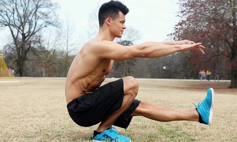 Man doing pistol squats