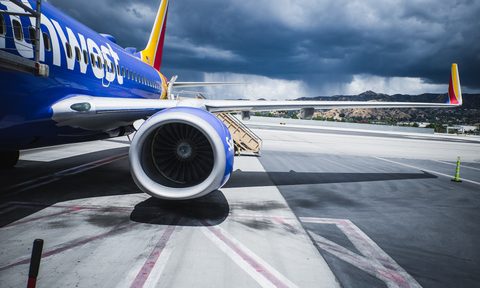 Southwest Airlines plane on the tarmac in a storm.
