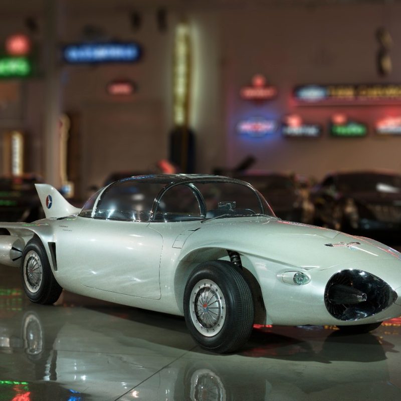 1956 General Motors Firebird II front end angle from passenger's side in a warehouse of cars.