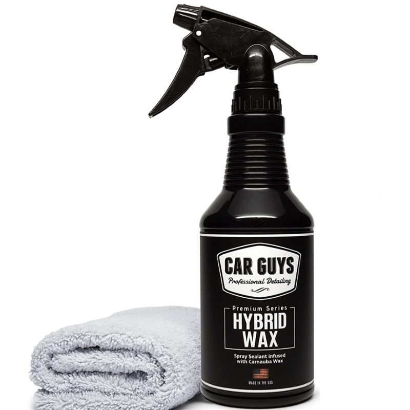CarGuys Hybrid Wax Sealant and a microfiber towel in front of a white background.