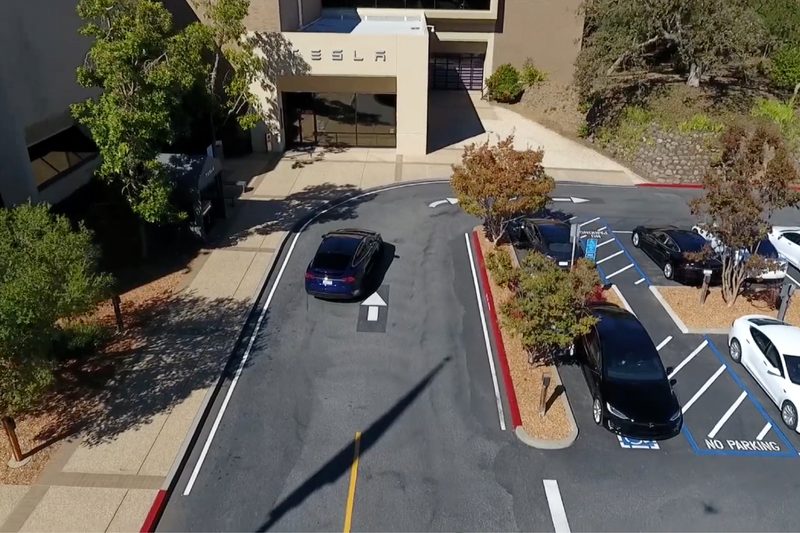 Overhead shot of Tesla Model X in a Tesla parking lot in California in 2016 video.