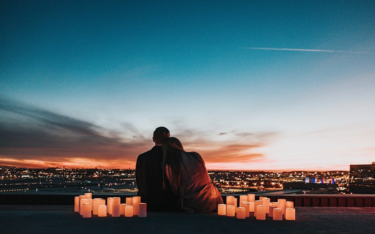 Couple watching the sunset together