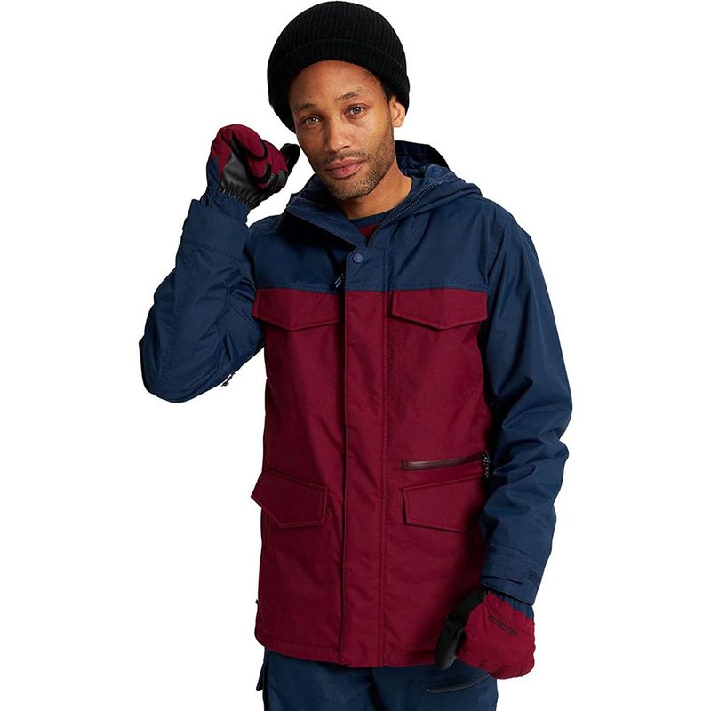 Male model wearing Burton Covert Jacket against on a white background.