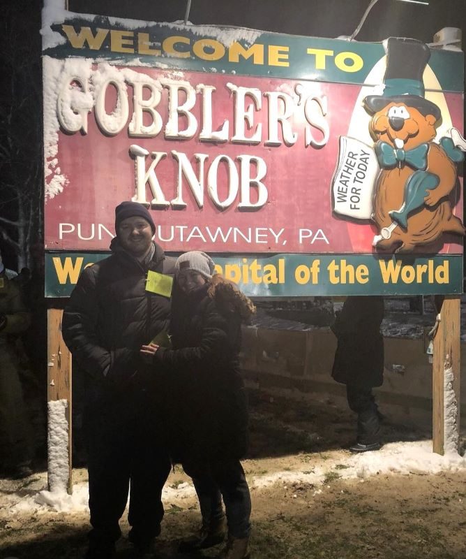 Couple posing at Gobblers Knob in Punxsutawney, PA