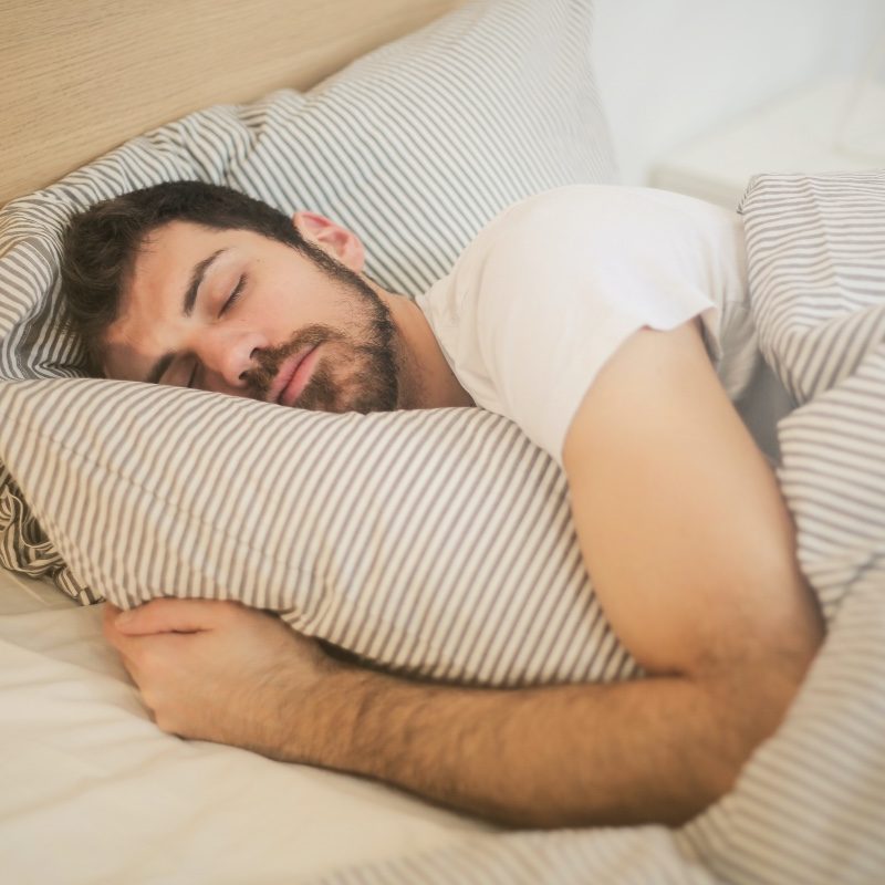 A man on his side sleeping