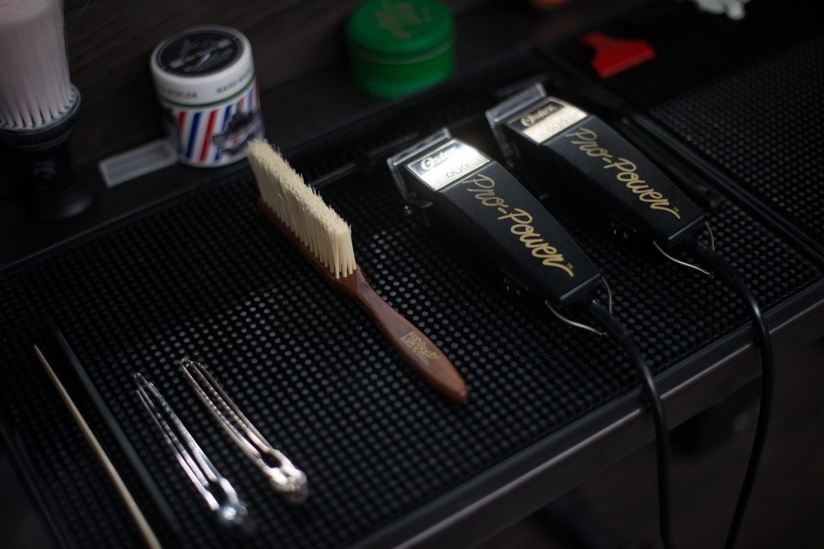 men's grooming tools on black background