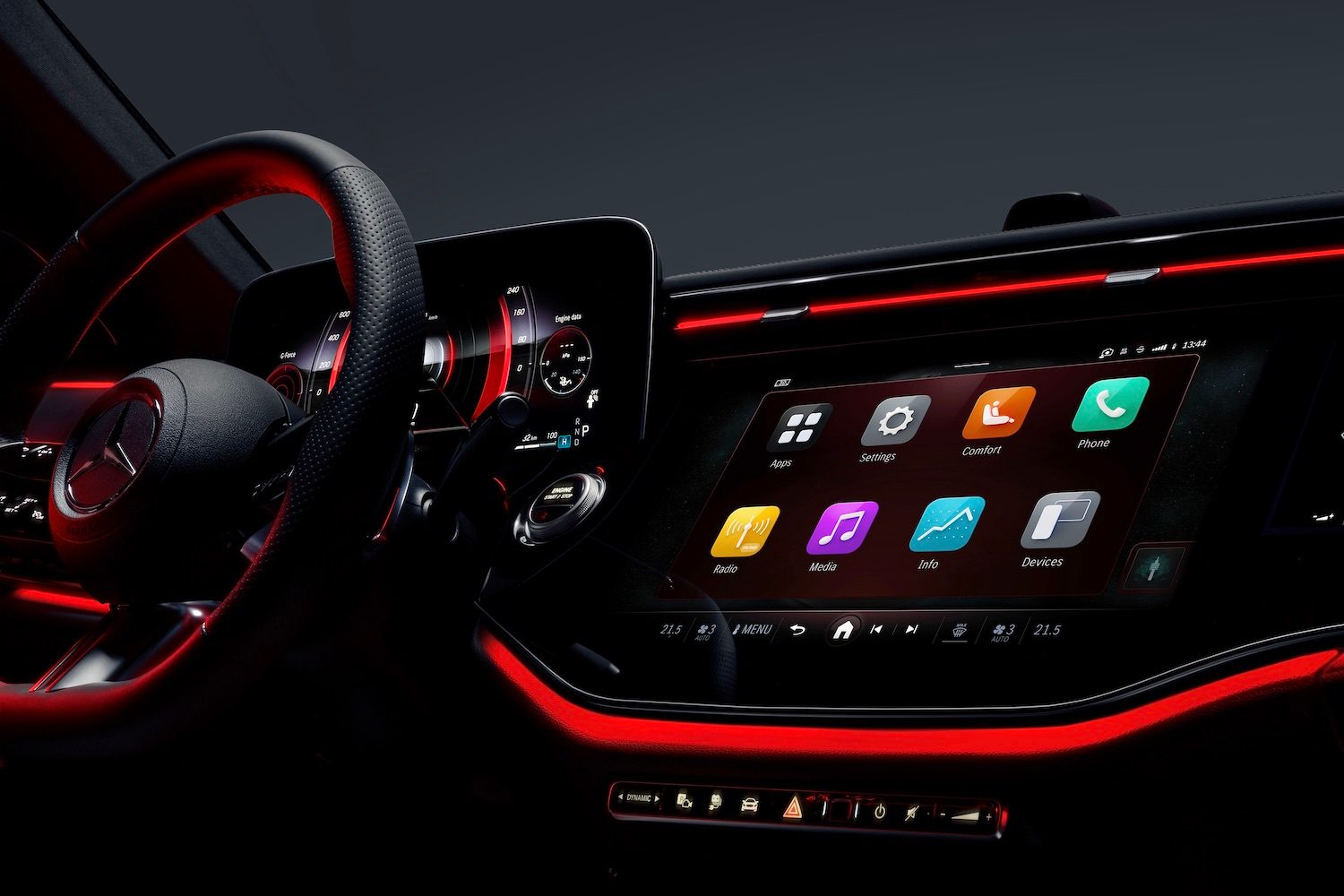 Close up of central touchscreen in the 2024 Mercedes-Benz E-Class Superscreen from the passenger's seat with red light.