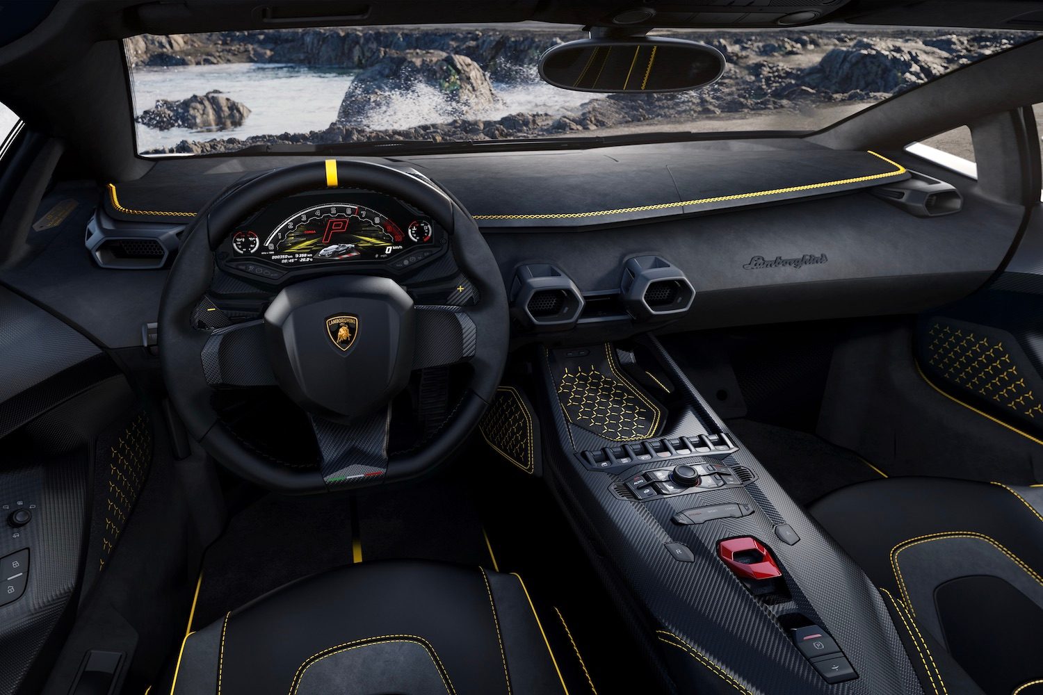 Close up of dashboard and steering wheel in the Lamborghini Aut&eacute;ntica with water and cliffs in the back.