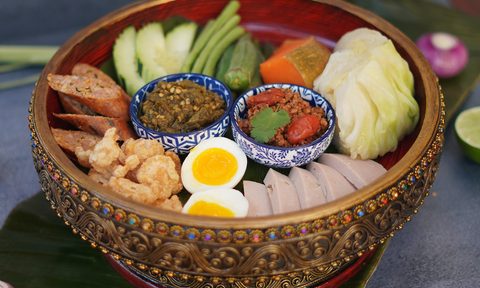 Spicy Shallot Nam Prik in a basket.