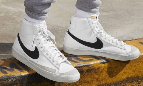 Nike gear, sneakers, worn on the sidewalk during an outing.