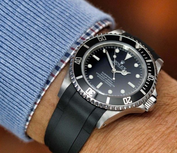 Arm with Rolex Submariner on it