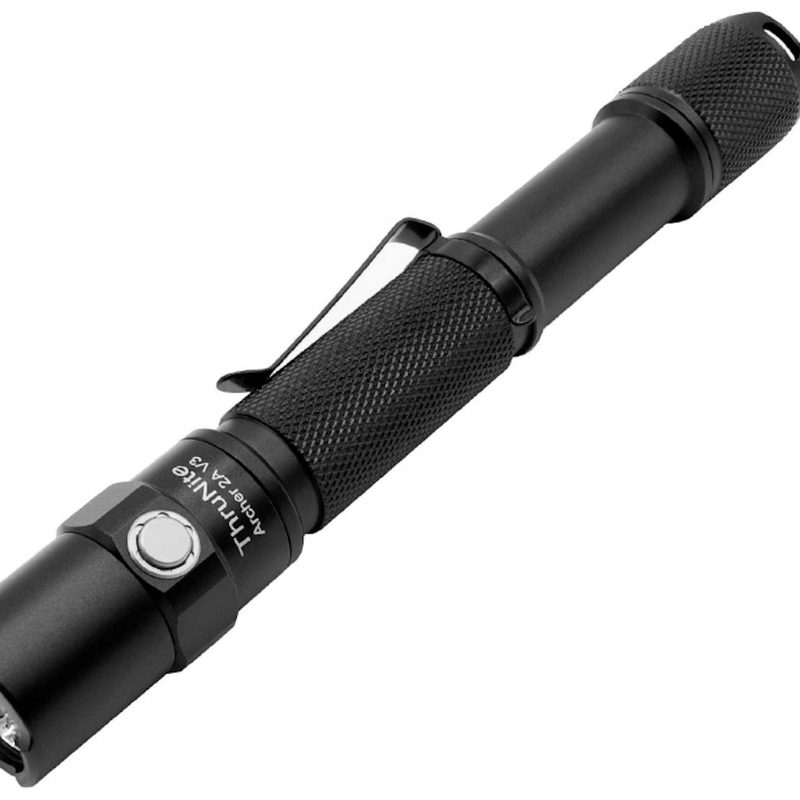 ThruNite LED Flashlight in front of a white screen.