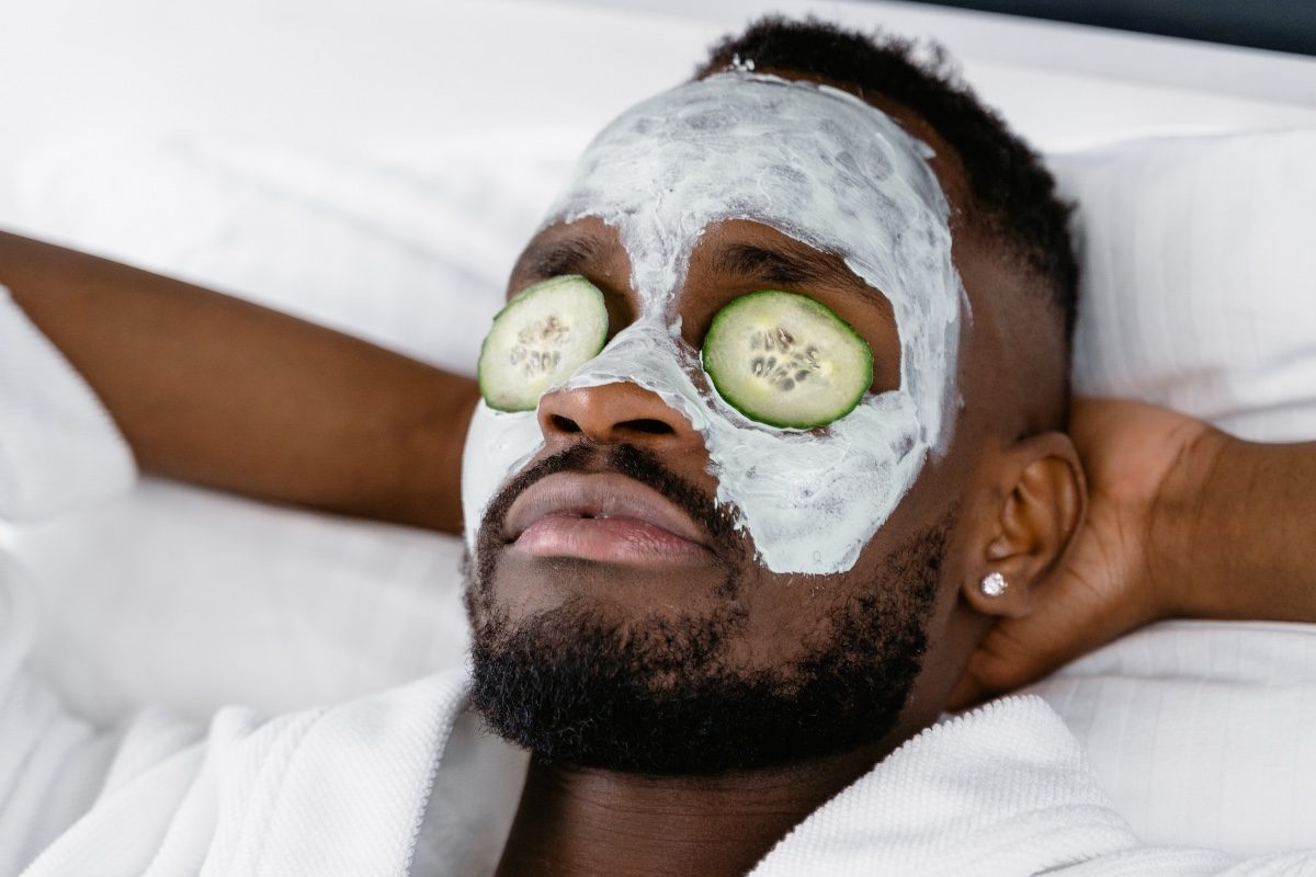 man receiving a facial