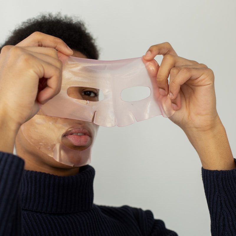 Man using skincare mask