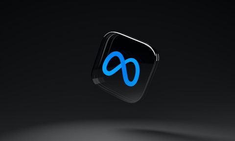 An image of the Meta symbol on the smartwatch face floating in air.