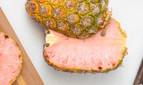 A halved pinkglow pineapple.
