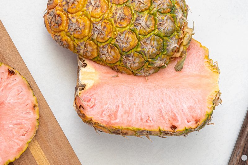 A halved pinkglow pineapple.