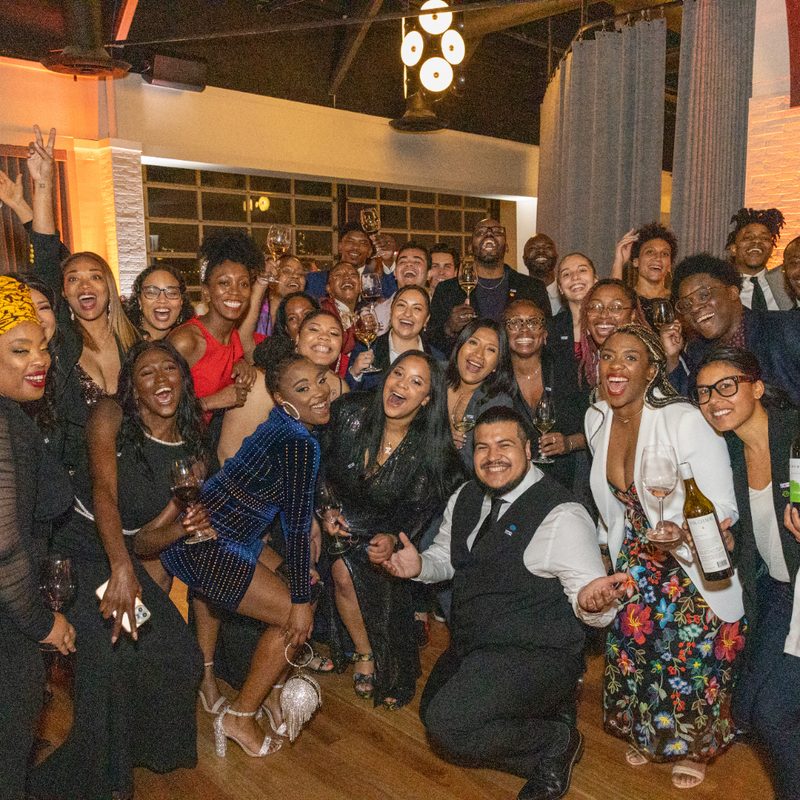 Scholars from The Roots Fund gather at event.