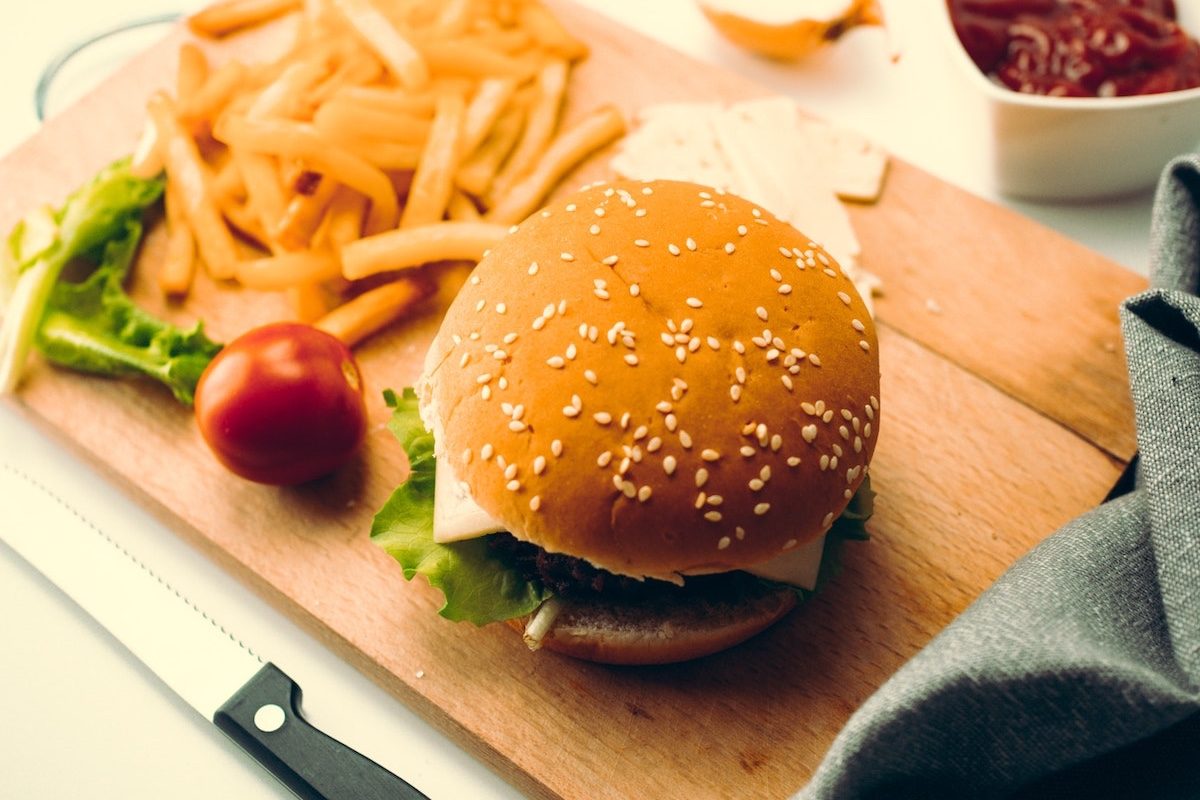 a vegan burger on a cutting board