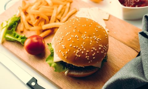 a vegan burger on a cutting board