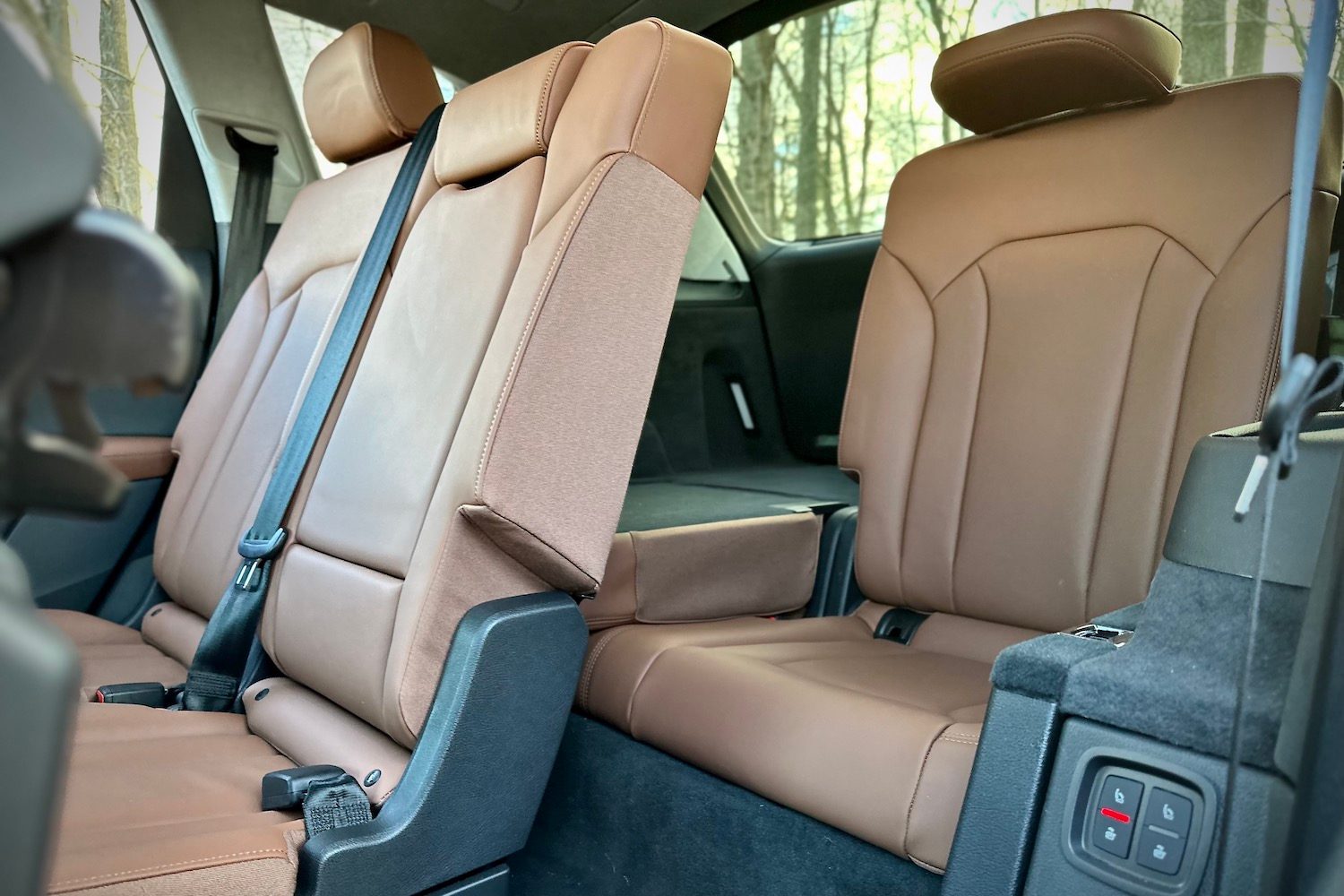 Third-row seats in the 2022 Audi Q7 Prestige from outside the vehicle with the second-row seats folded.