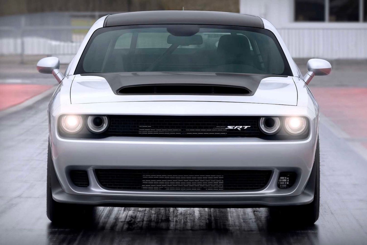 Close up of front end of 2023 Dodge Challenger SRT Demon 170 on a drag strip.