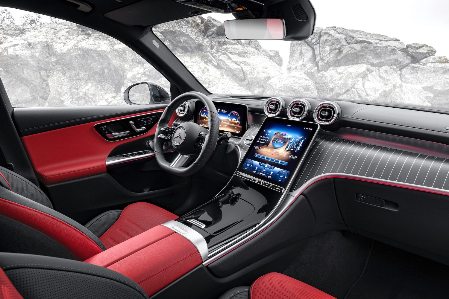 Close up of dashboard in the 2023 Mercedes-Benz GLC parked in front of mountains.