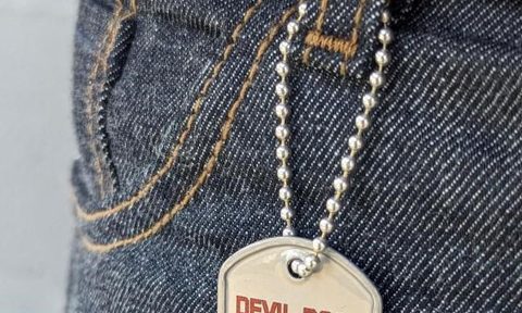 Devil Dog Dungarees dog tag close-up