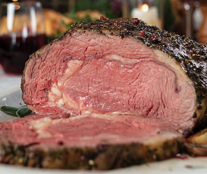 Dijon-herb prime rib roast with garlic butter mushrooms from Omaha Steaks