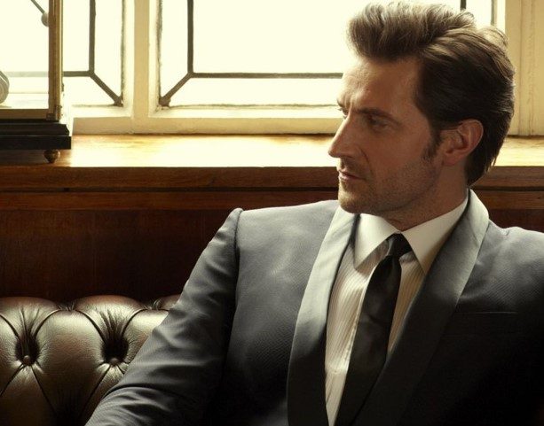 Man in a tux and black tie