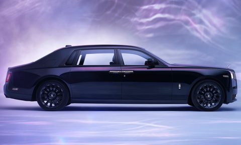 Rolls-Royce Phantom Syntopia side profile in a studio with purple swirling lines in the back.