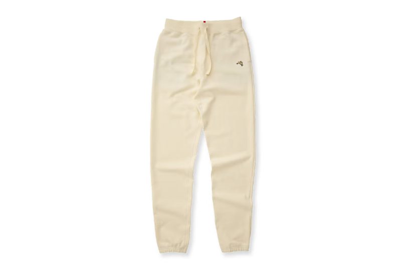 Tracksmith trackhouse sweatpants in ivory color.